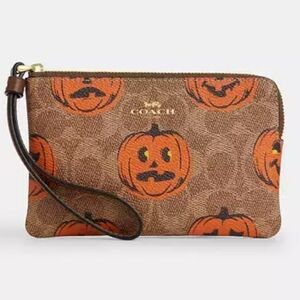 Limited Edition Halloween Coach Pumpkin Print Wristlet